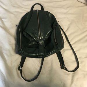 Great faux leather green backpack
